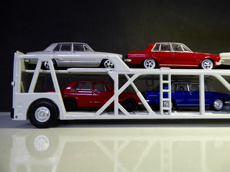Illustration for article titled Hot Sixty 4th: Land of the Tomica Transporter